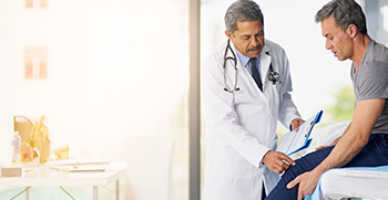 A pain management specialist seeing a patient for a visit